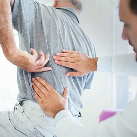 Chiropractic Arvada CO Man With Back Pain